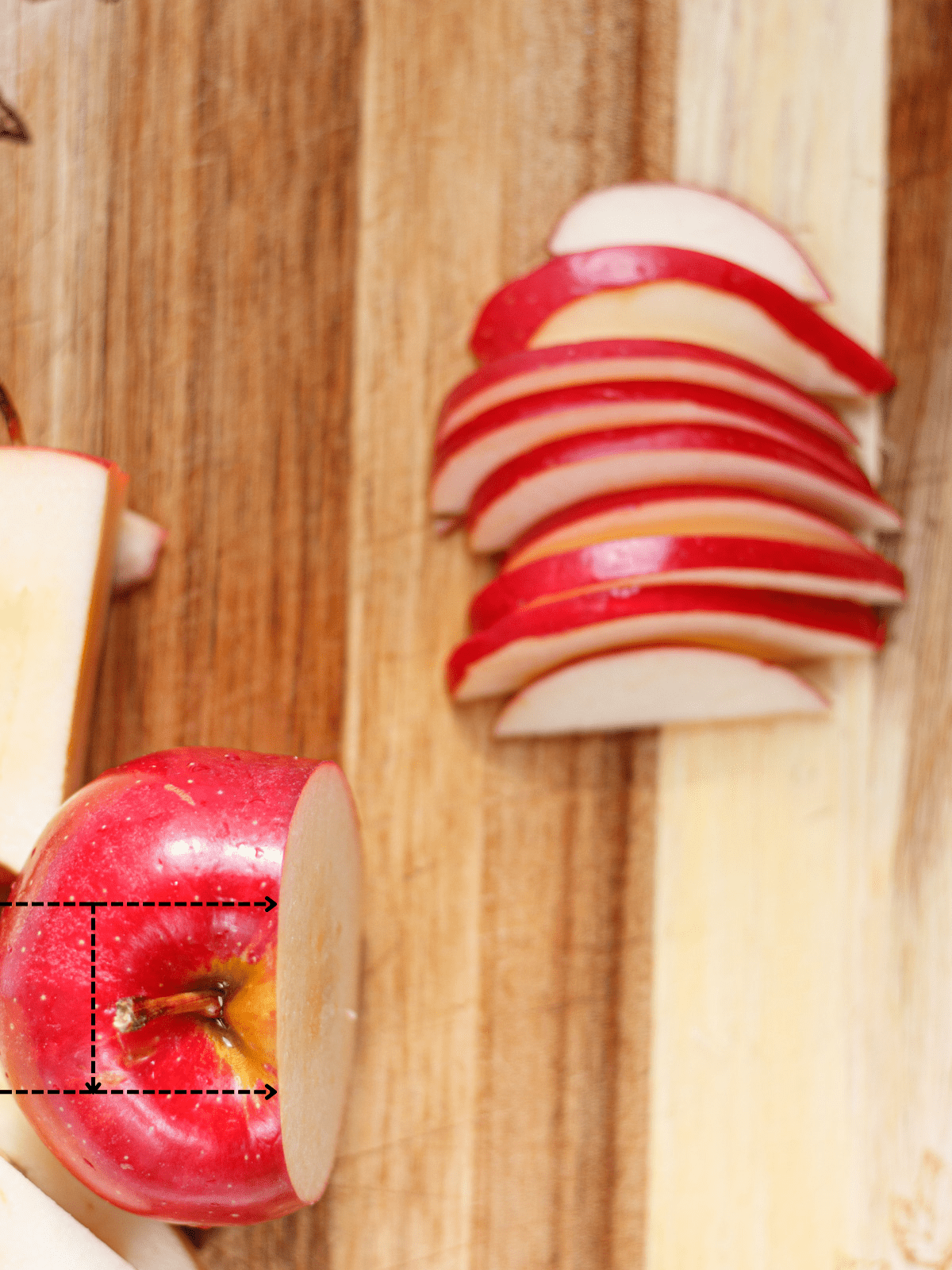 Arrows and lines showing you how to slice an apple.