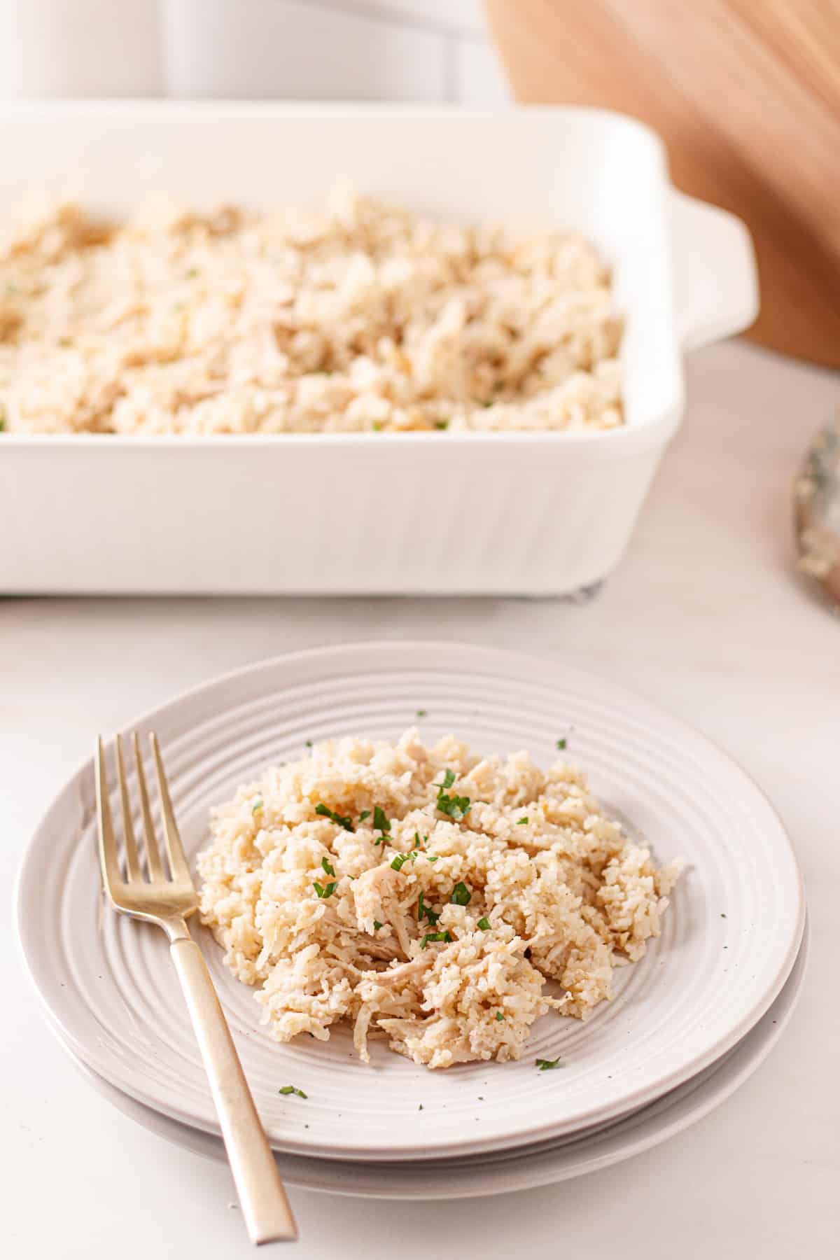 Dairy-free chicken and rice casserole on a white plate.