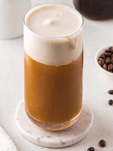 Dairy-free cold foam over iced coffee.