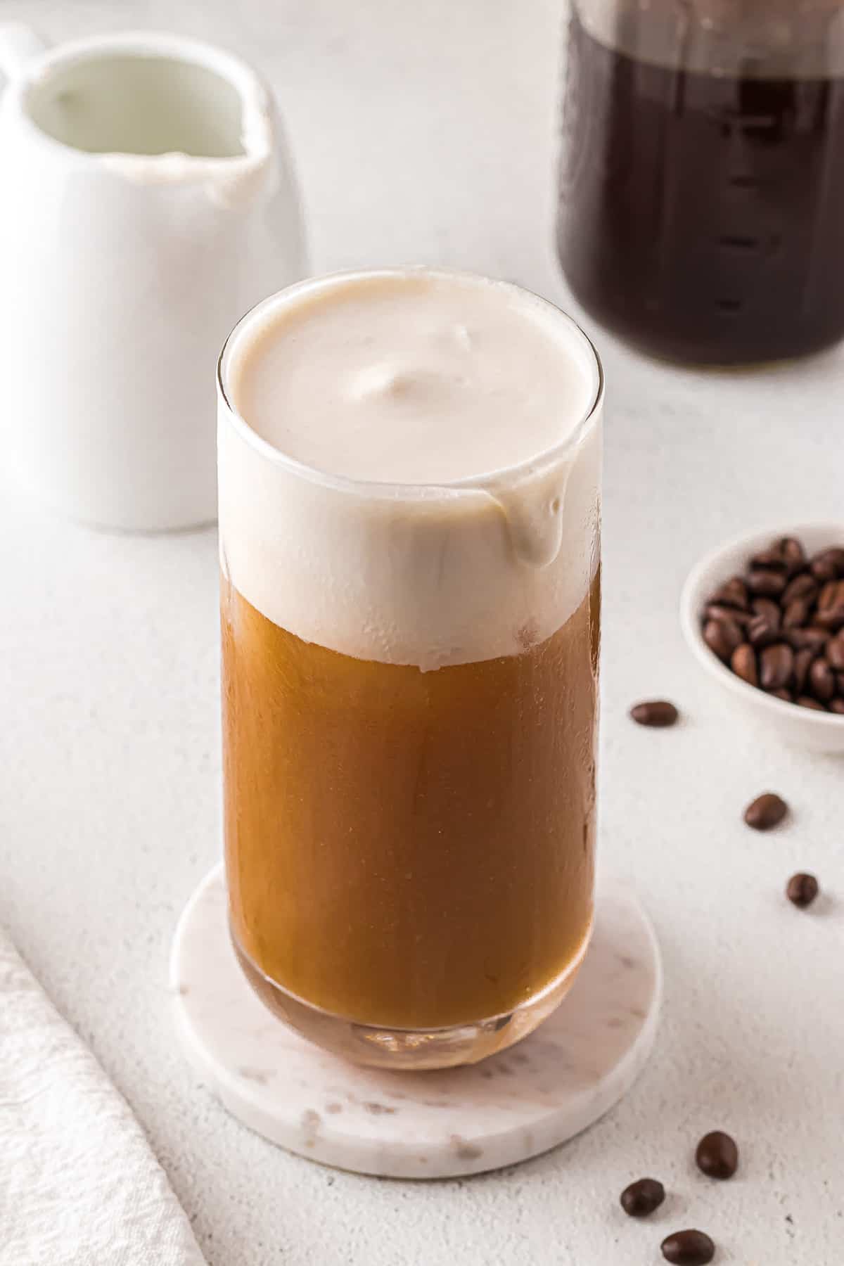 Dairy-free cold foam over iced coffee.