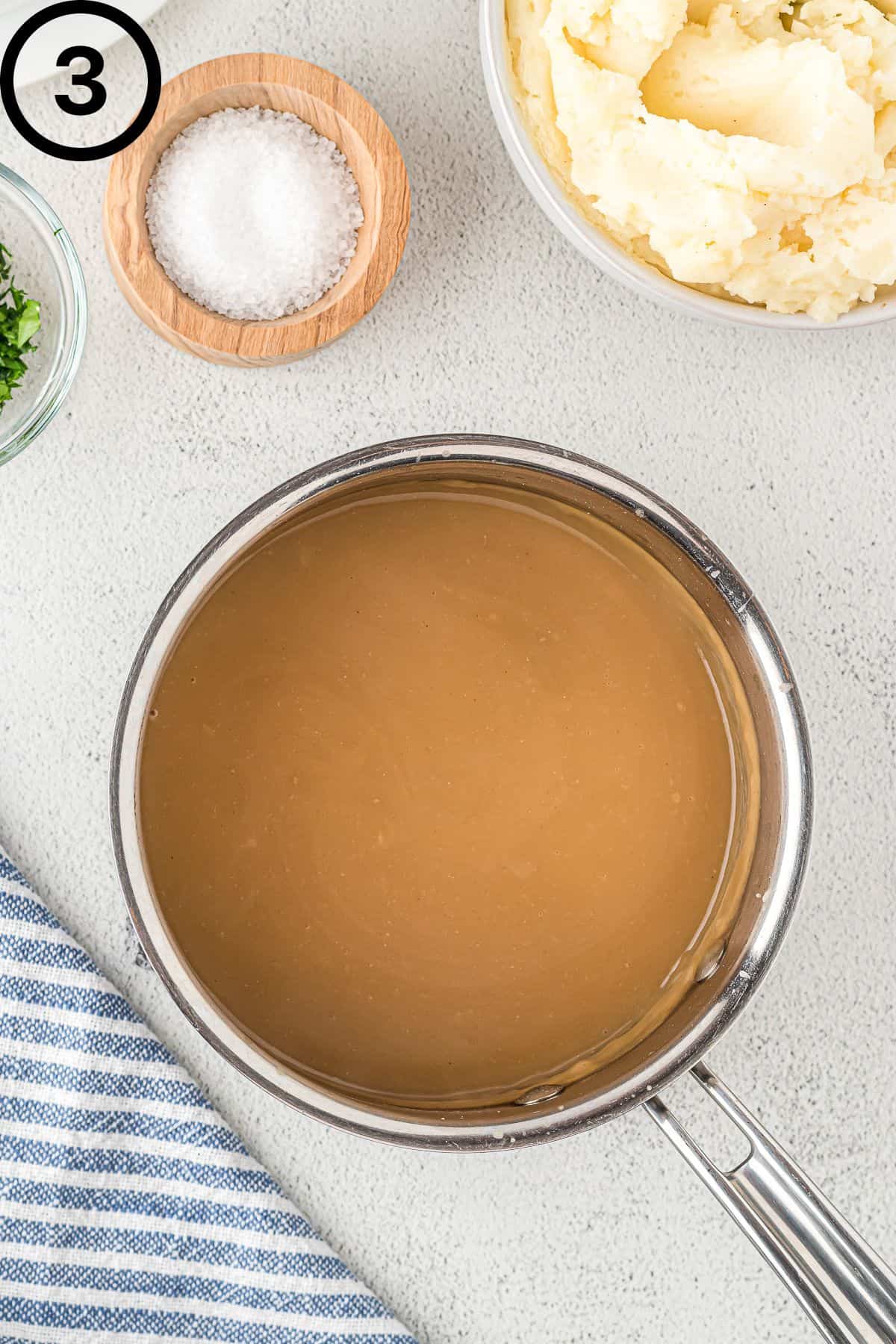 Dairy-free brown gravy in a pot.