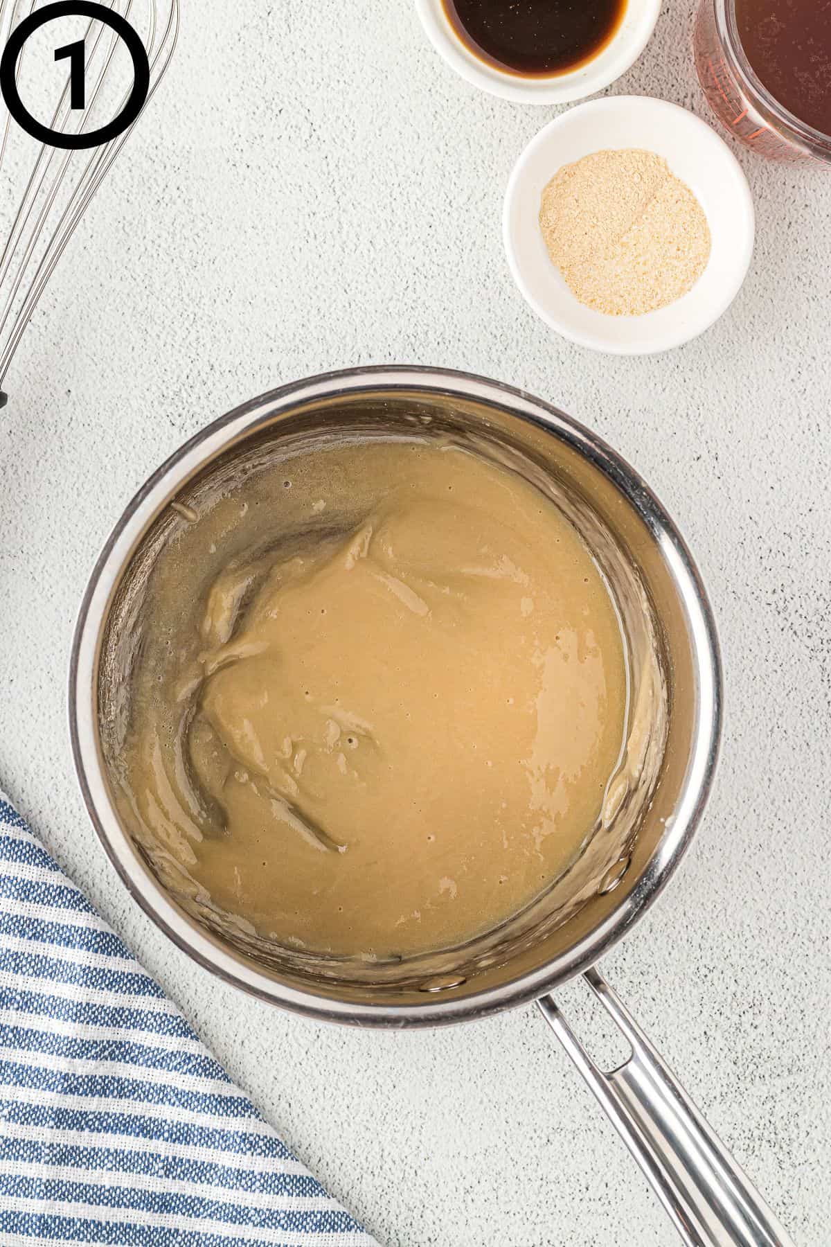 Butter and flour roux in a pot.