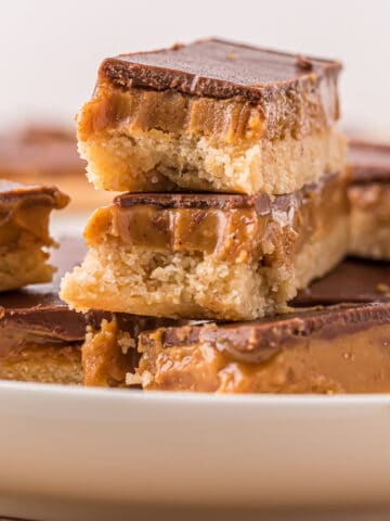 Healthy peanut butter Twix bars on a plate.