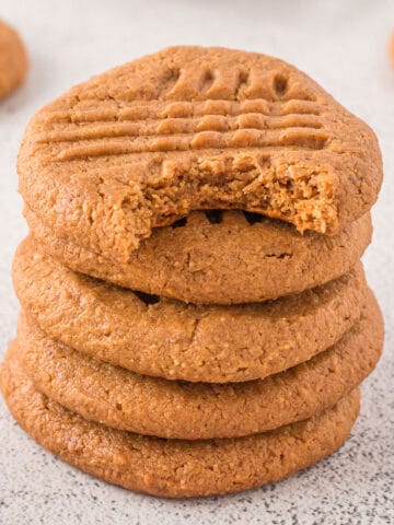2 ingredient peanut butter cookies stacked.