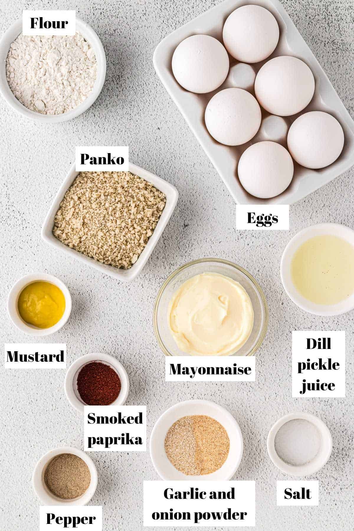 Ingredients to make air fryer deviled eggs. Text on image to label ingredients.